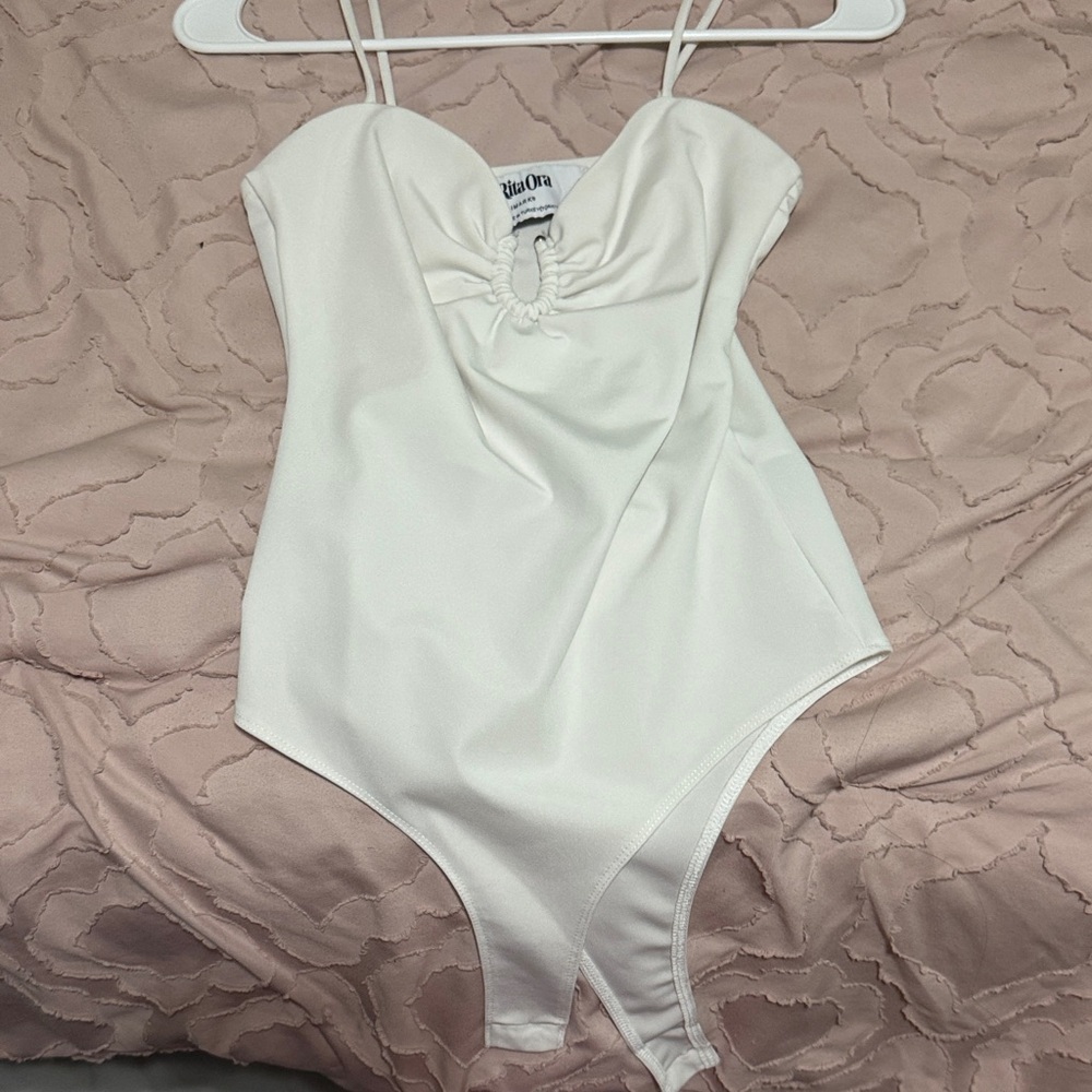 Minimal White One-Piece Bodysuit with Snap Bottom
